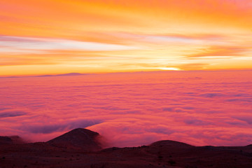 Heatwave hot sun. Climate Change. Global Warming.Beautiful landscape in the mountains at sunrise.Mountain Mist in sunrise,mist on sunrise,mist over mountain during sunrise