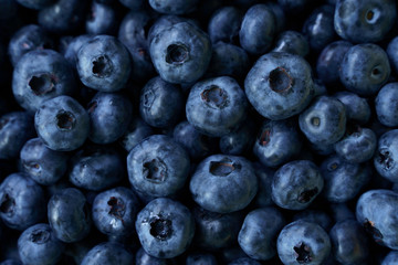 Flat lay raw blueberry natural pattern . High quality photo