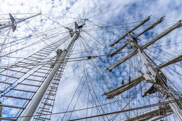 Frog's view of the masts, rigging and ropes of a large sailing vessel