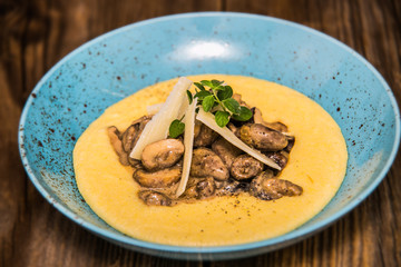 Chicken hearts with cheese and mashed potatoes. The food in the restaurant. Food styling and restaurant meal serving.