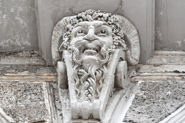 Old building facade mascaron decoration in Tbilisi Georgia