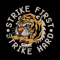 Traditional Tattoo Tiger with Lightning Illustration and Strike First Strike Hard Slogan Artwork for Apparel and Other Uses
