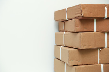 cardboard boxes on white background with copy space