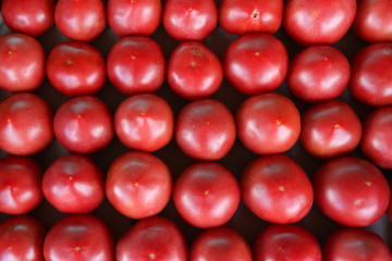 red tomatoes at the market top view