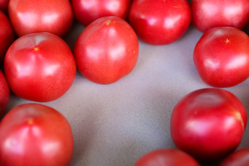 red tomatoes at the market top view