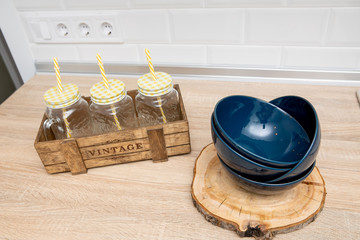 Modern kitchen countertop with domestic culinary utensils on it