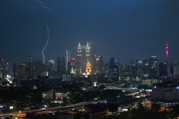 Thunderstorm lightning strike and heavy raining in Kuala Lumpur city