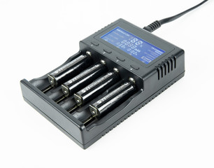 Battery charger with batteries and without batteries isolated on white