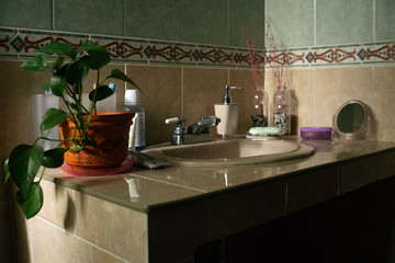 sink of a fully arranged home bathroom