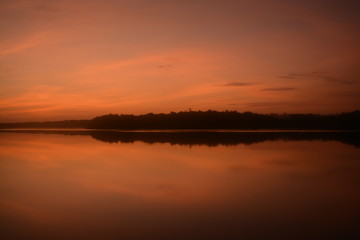 Naklejka na ściany i meble sunset over lake