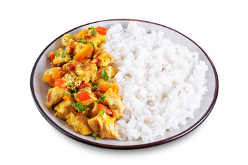 Curry chicken with rice in a plate on a white isolated background
