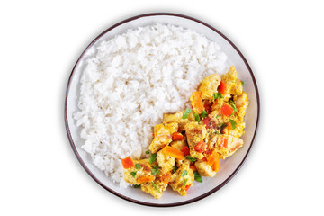 Curry chicken with rice in a plate on a white isolated background