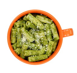 Pasta with original pesto green sauce in Genoa (Genova) Italy on white background, Pasta with basil pesto herbs isolated. Italian Food. 