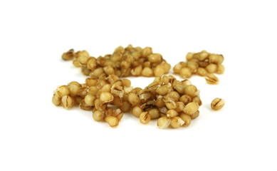 Cooked bulgur wheat isolated on white.