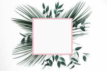 Tropical green leaf frame on white