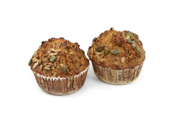 Whole grain muffins isolated on white. Nutrition concept -Healthy small salt muffin bun over white background. Healthy food, Diet, . Homemade delicious baked muffin.