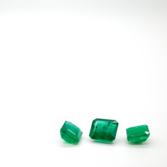 Emerald Loose Gemstones On White Background
