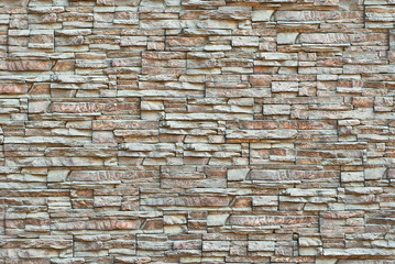 Texture of brick wall and concrete blocks. Samples of stone plates stacked evenly in a row.