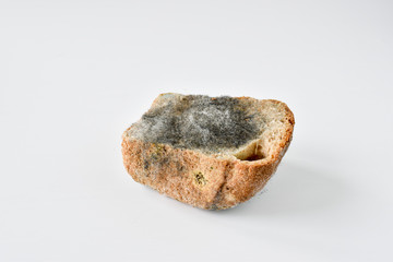 Damaged product. Half a loaf of bread is moldy