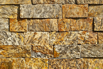 Texture of brick wall and concrete blocks. Samples of stone plates stacked evenly in a row.