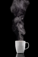 Coffee cup and steam. Freshly brewed coffee in a white ceramic mug.