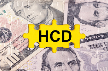 Puzzle with the image of dollars in the center of the inscription -HCD