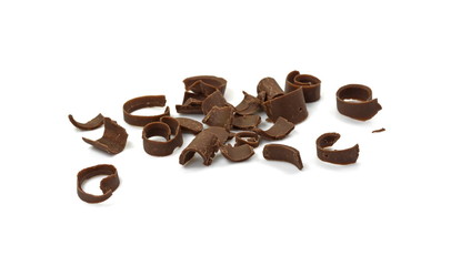 CHOCOLATE ROLL. Chocolate Curls Isolated On White Background. Group of chocolate shavings. 