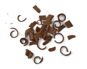 CHOCOLATE ROLL. Chocolate Curls Isolated On White Background. Group of chocolate shavings. 