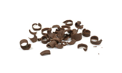 CHOCOLATE ROLL. Chocolate Curls Isolated On White Background. Group of chocolate shavings. 