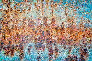 blue grunge painted metal texture of a junk car body