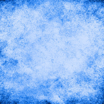 Blue Splatter Grunge Texture Background With Darker Edges And Lighter Center.