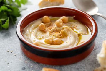 Hummus served in bowl on table