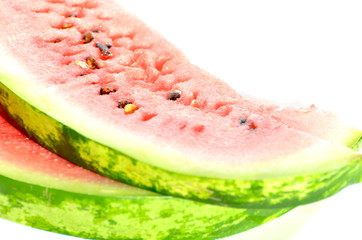 Two slices of watermelon isolated on white, delicious berry