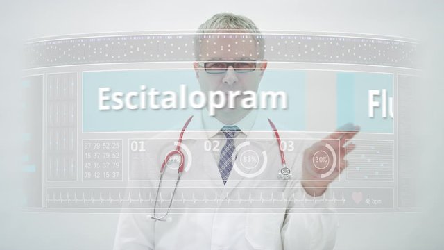 Doctor scrolls to FLUOXETINE generic drug name on a touchscreen display