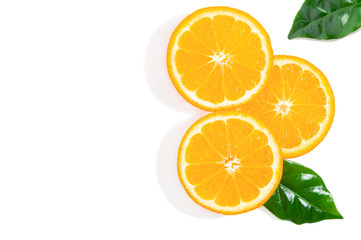 Three slices of orange fruit and green leaves isolated on white background. Creative background, top view with copy space.