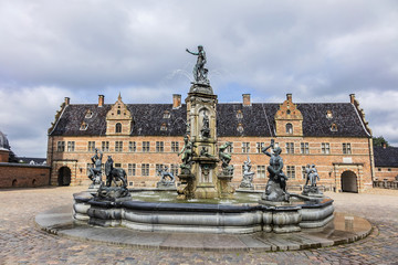 Fototapeta na wymiar Neptune Fountain (1622) in Frederiksborg Castle (Frederiksborg Slot, XVII century). Hillerod, Denmark.
