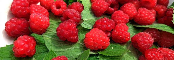 photo of raspberries and mint leaves. ingredients for mojito. Top view