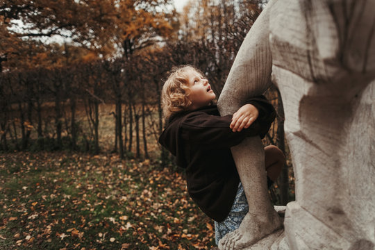 Cute young girl in the autumn park