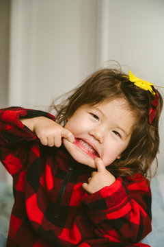 Little girl making silly face