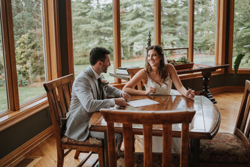 Bride and Groom Signing Wedding License