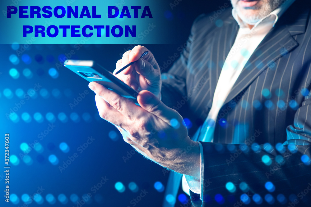 Aufkleber personal data protection. concept of mobile phone security and user data protection. a man is holdin