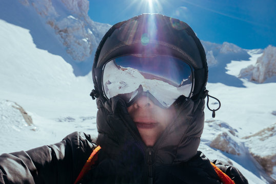 woman in skiwear in the mountains