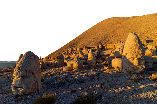 Statues on top of the Nemrut Mountain in Adiyaman, Turkey. To watch the sun set and rise. with white isolated background