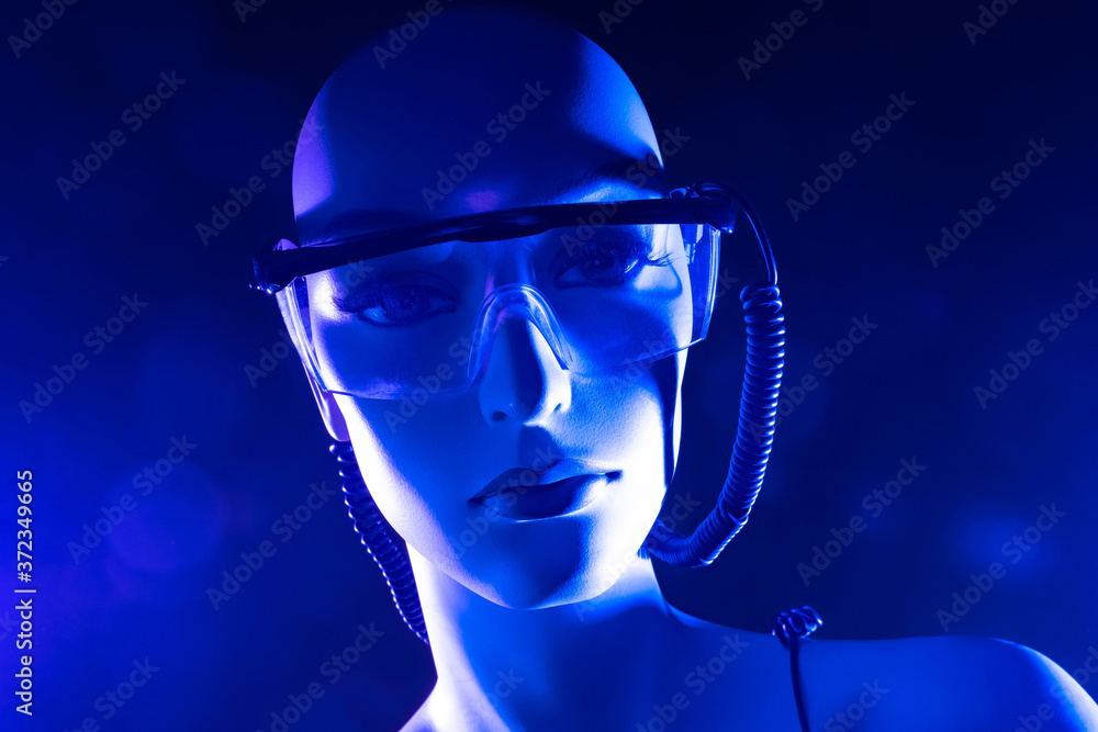 Poster artificial intelligence. future technology. smart robots. portrait of a female robot on a blue backg