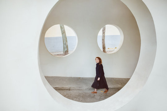 A ginger girl in circles.