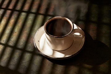 Hot Cup of Coffee with Shadows