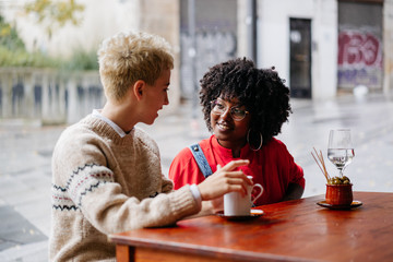 Two women friends at a cafe