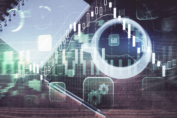 Double exposure of forex graph drawing and work table top veiw. Concept of financial analysis.
