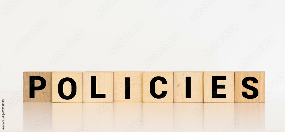 Poster policies word made with building blocks