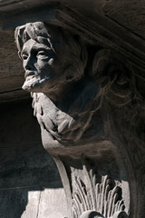 Closeup of amazing corbel on the old building on Market Square in Lviv, Ukraine
